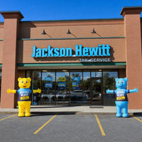 Refund Bear giant inflatables outside a Jackson Hewitt tax service office